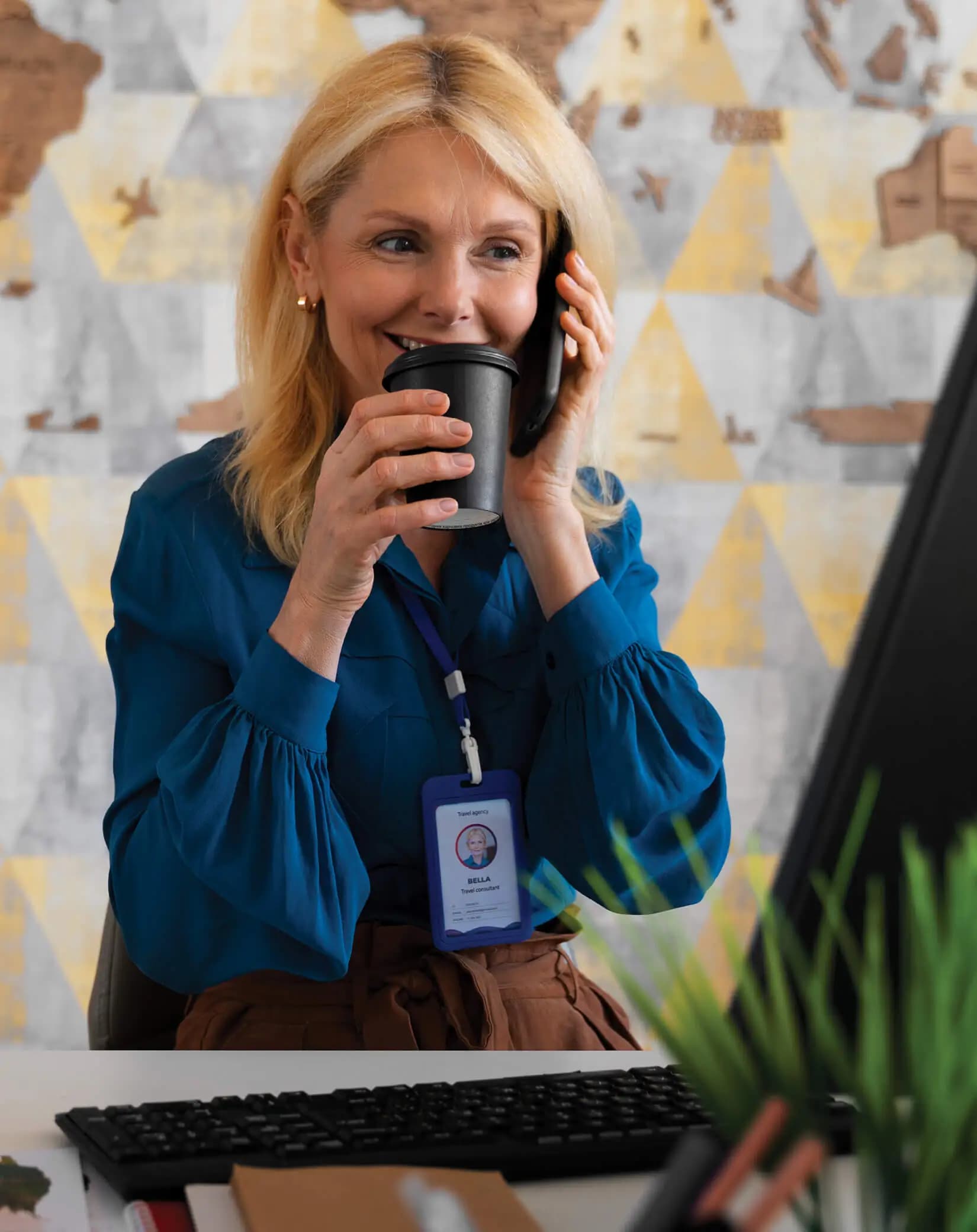 Placeholder — replace with a photo of a travel agent on a call